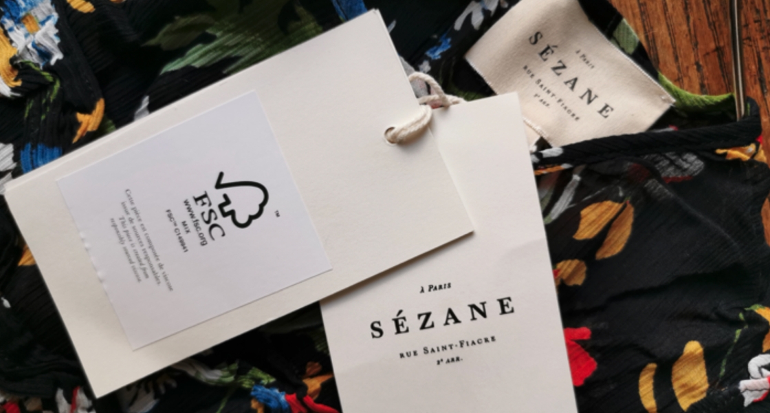 Close shot of tags on a flower print shirt