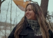 Portrait of woman looking away and smiling - Christina Bekintis of Wahjohtowin Development